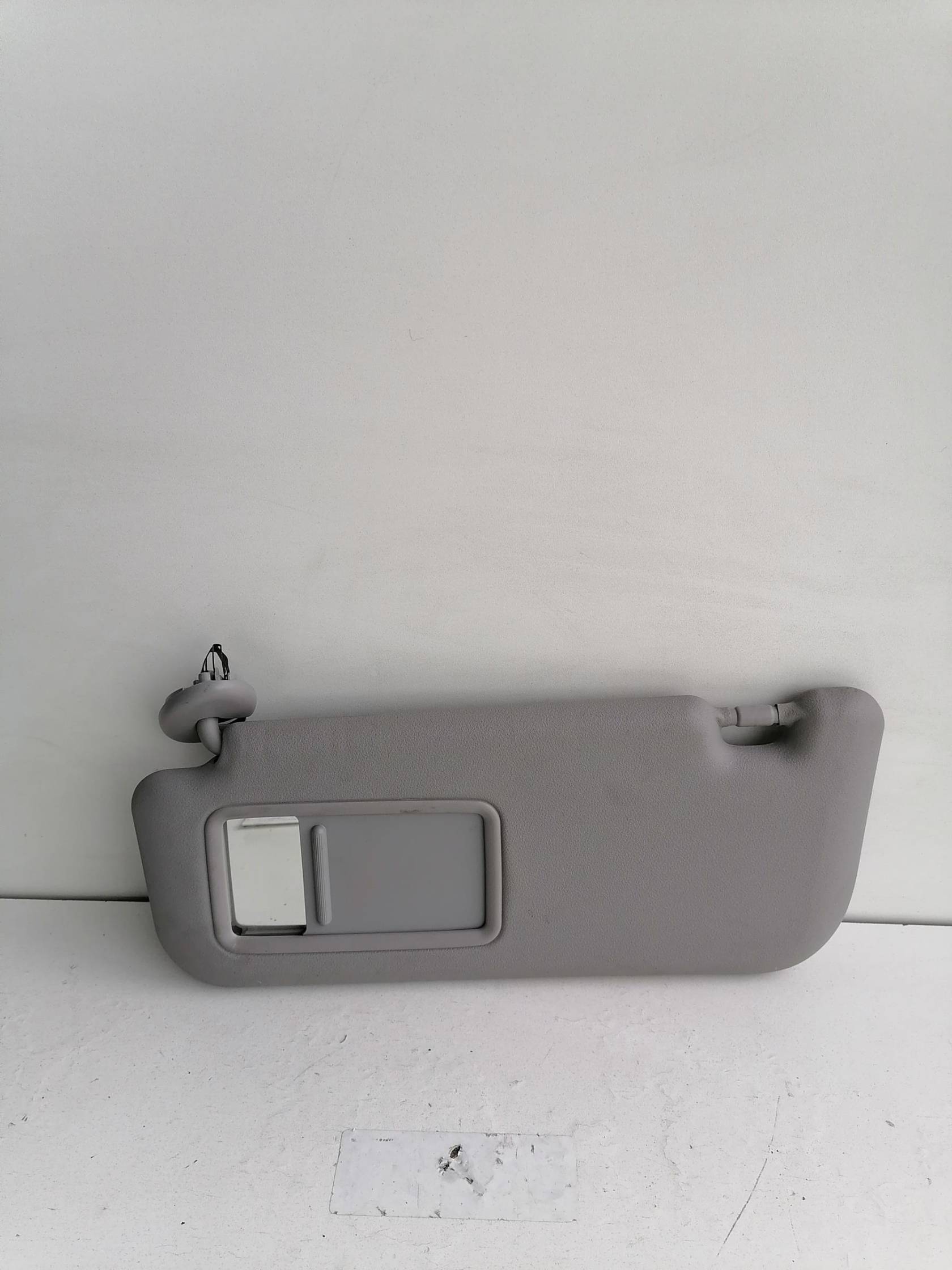 Aletta parasole parabrezza sx.